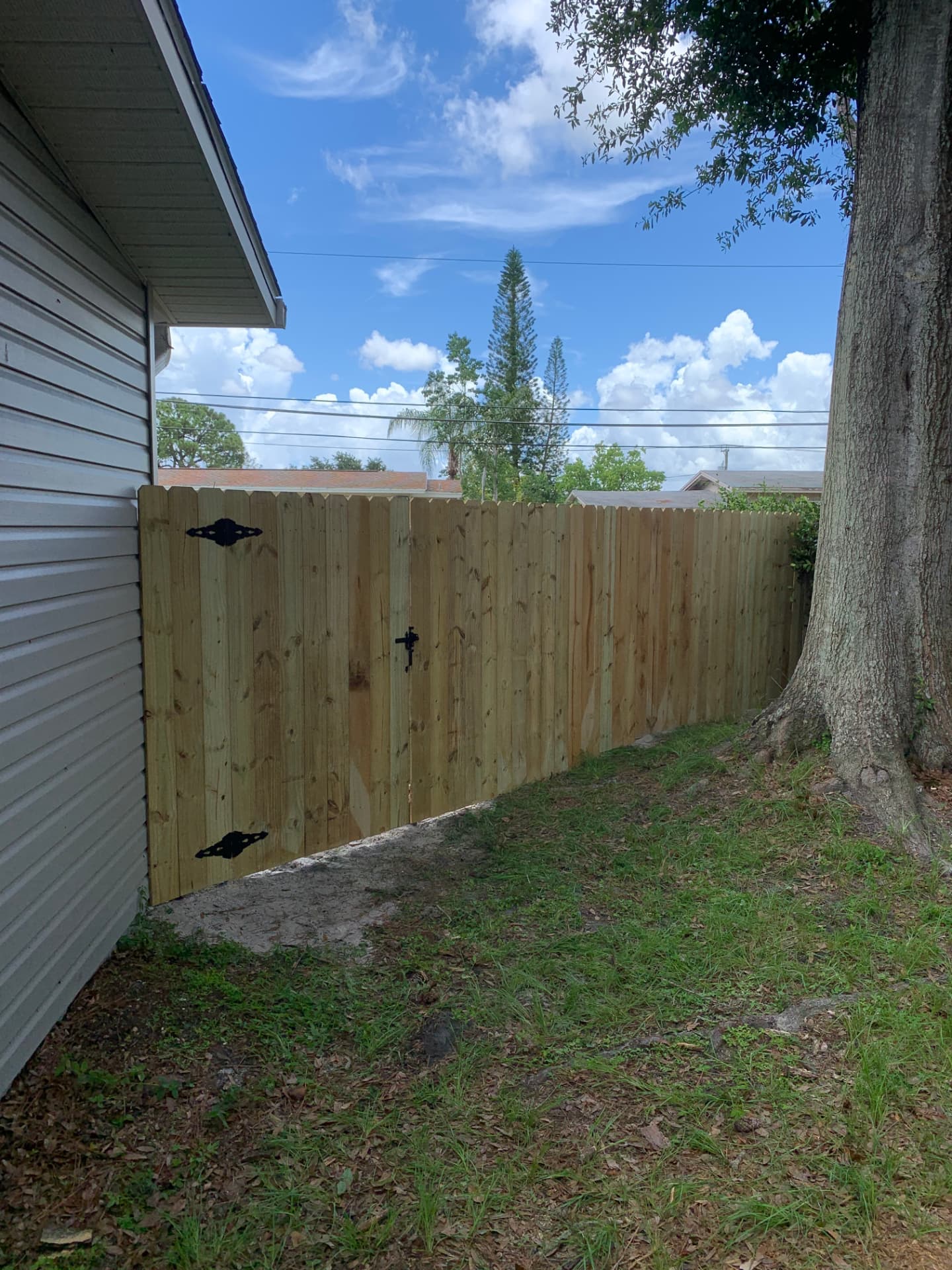 6 ft pressure treated pine dog-ear privacy fence with matching single gate